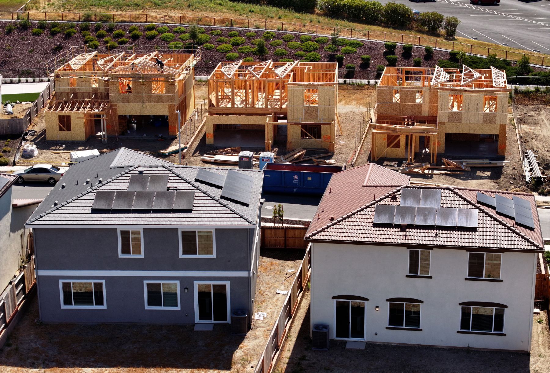 New homes under construction. The completed homes have solar panels
